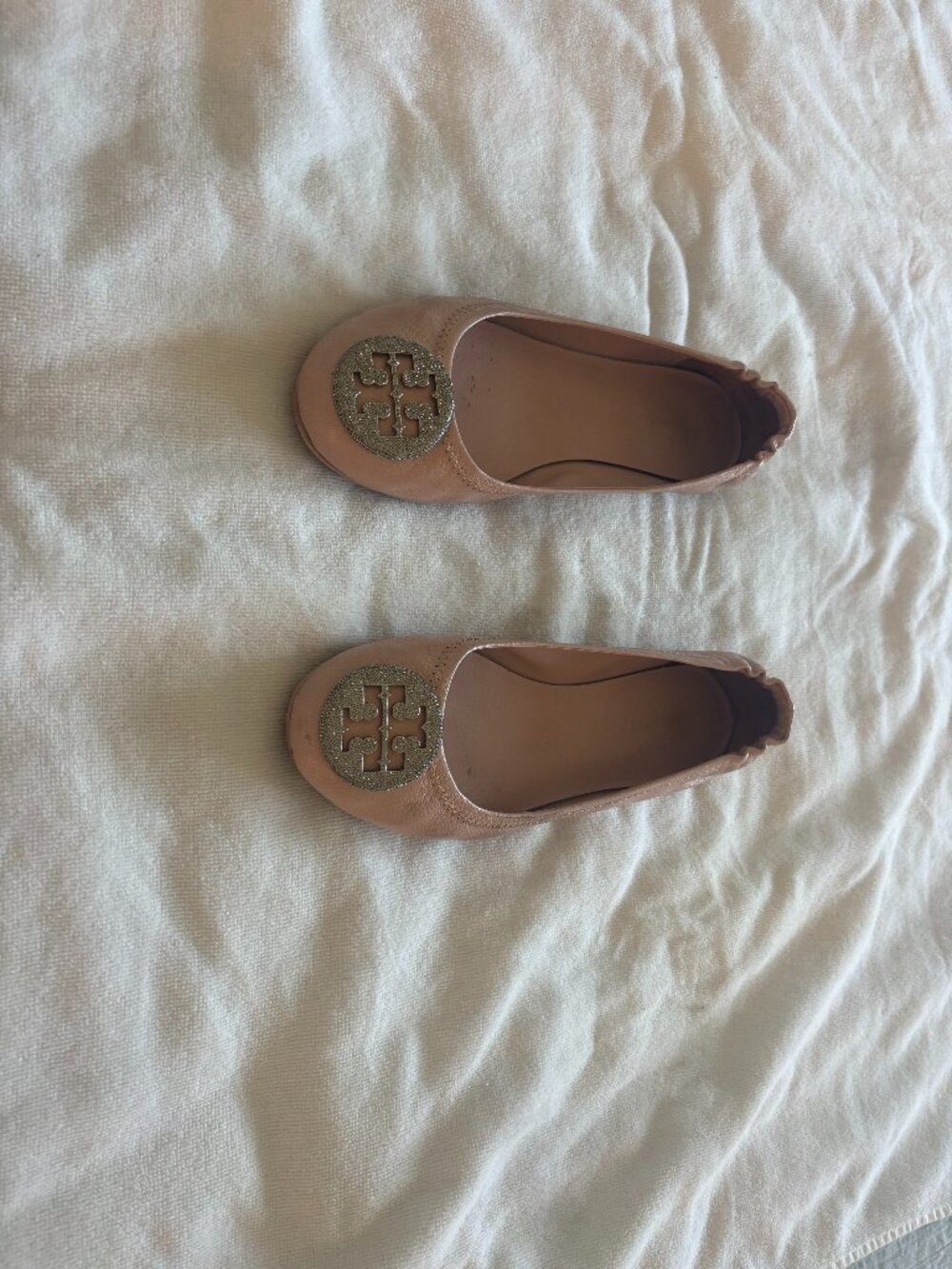 Tory Burch Minnie Travel Ballet Flats in a shell pink shade with a silver pavé l